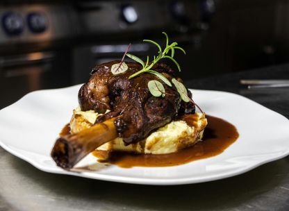 Delicious roasted lamb shanks served on creamy mashed potatoes with rich gravy.